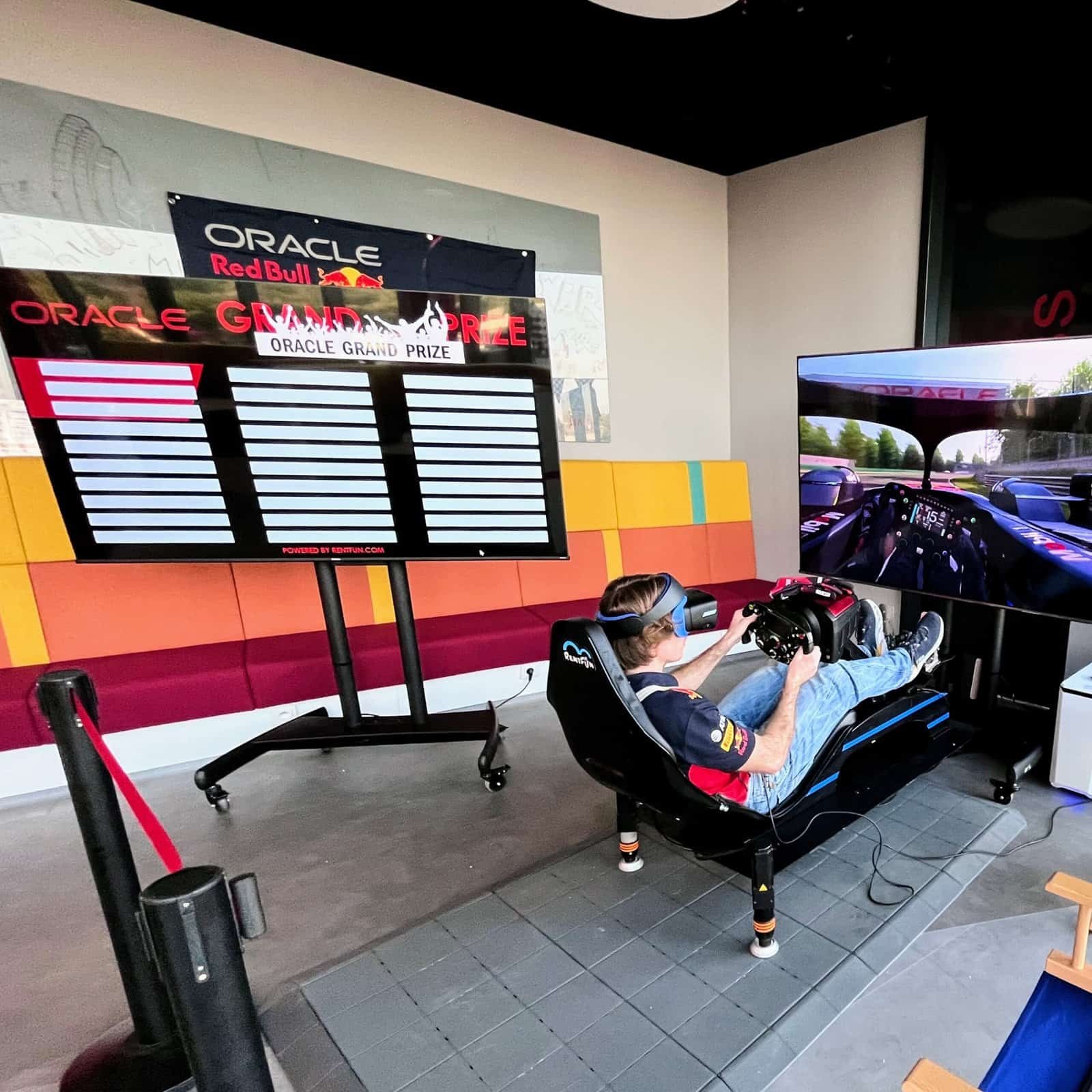 Professional racing simulator setup with motion, VR, real racing seat and laps competition for Oracle in London, UK.