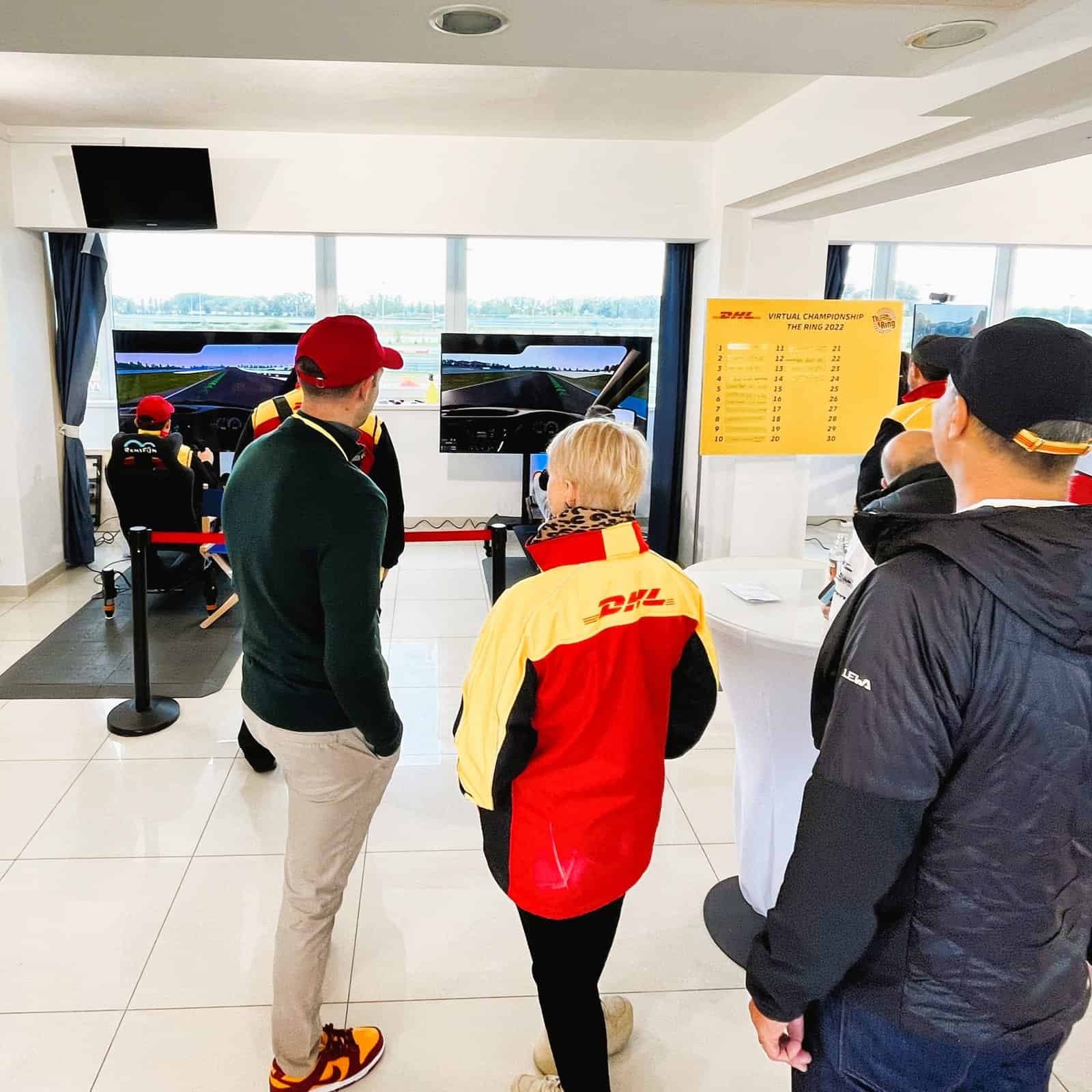 RoarFun clients. DHL van motion VR simulator on F1 racing track