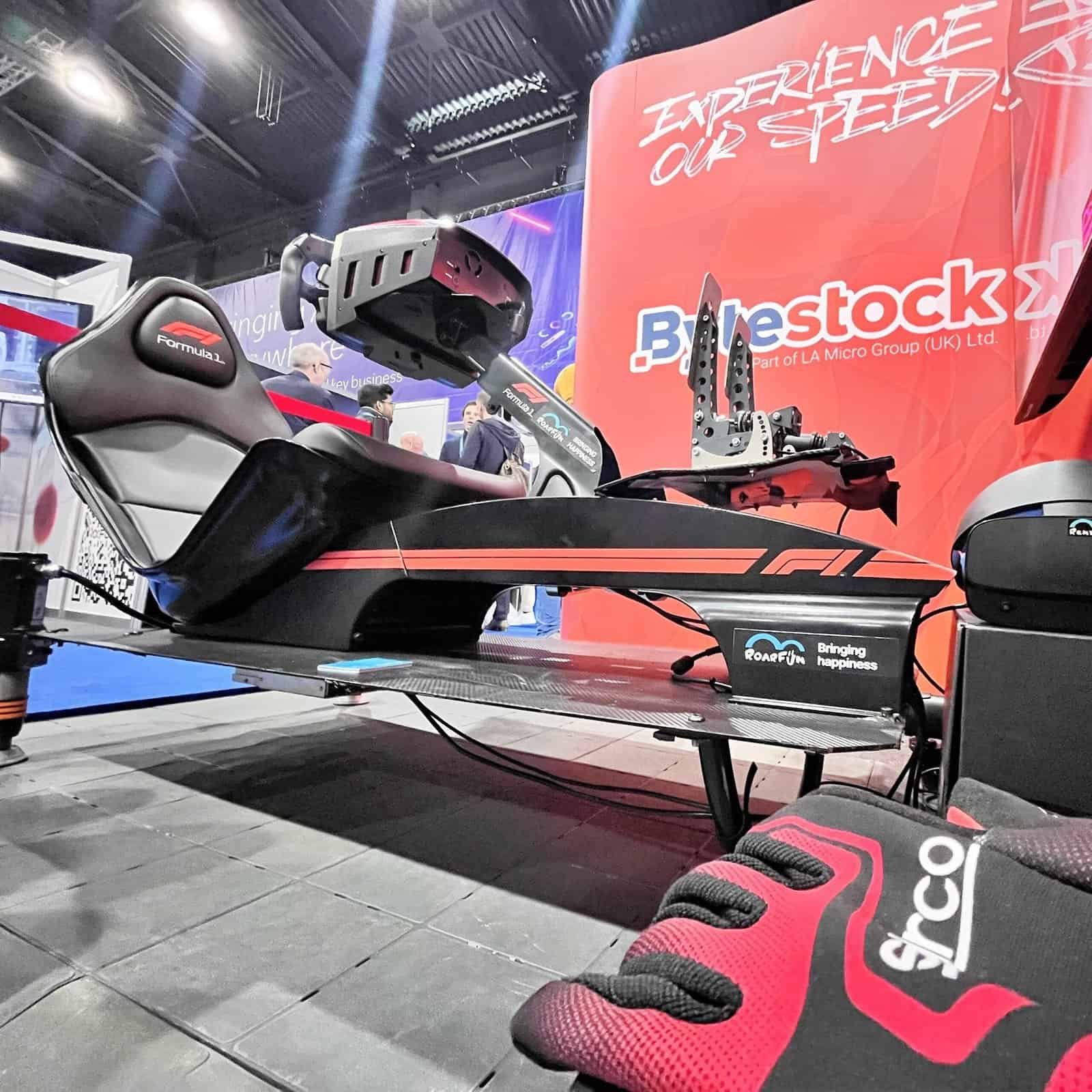 Formula bespoke motion setup with F1 licensed steering wheel, professional pedals and Ferrari steering wheel.